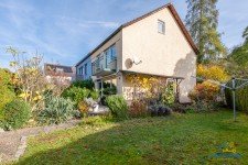 Hauptbild Liebevoll modernisiertes Zuhause mit idyllischem Garten und Garage im begehrten R-Westen